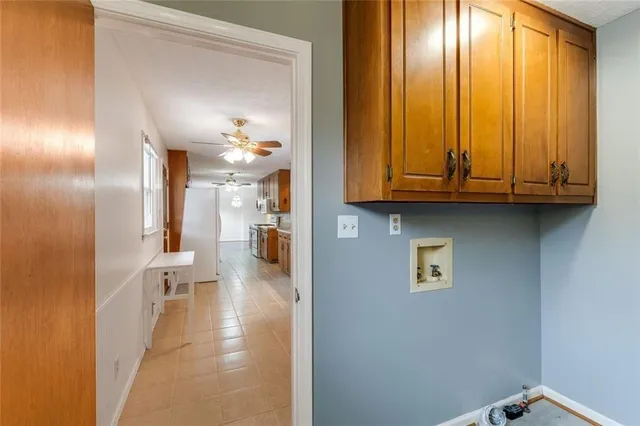 a view of a hallway view with staircase