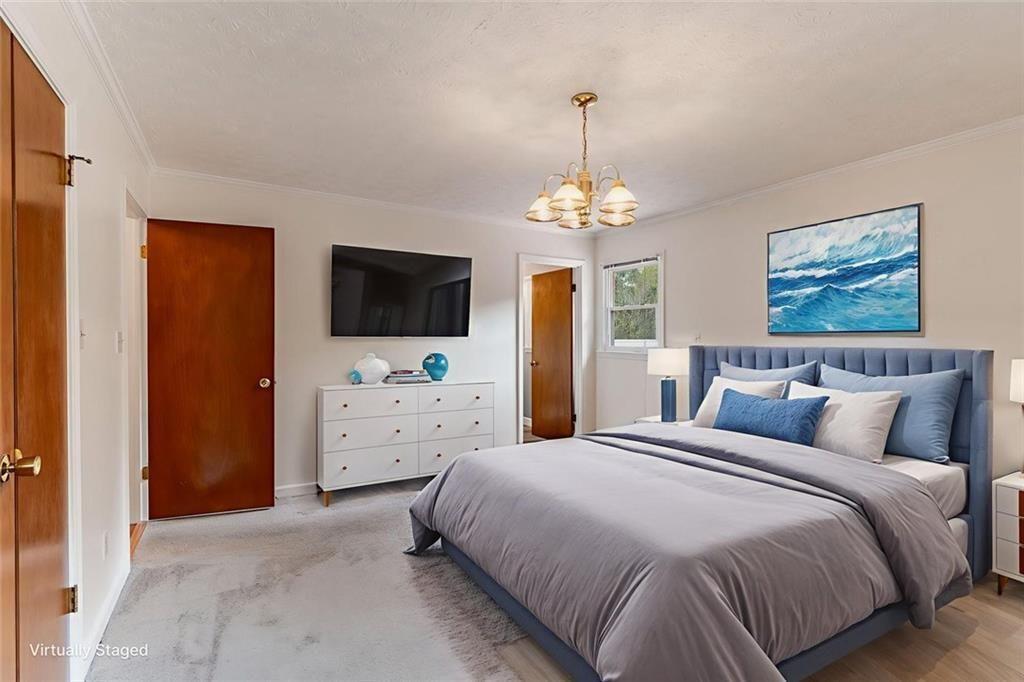7306 Mt Vernon Road Lithia Springs, GA 30122 - Photo 19 of 48 a spacious bedroom with a bed and a flat screen tv