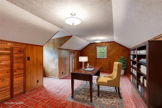 a workspace with furniture and window