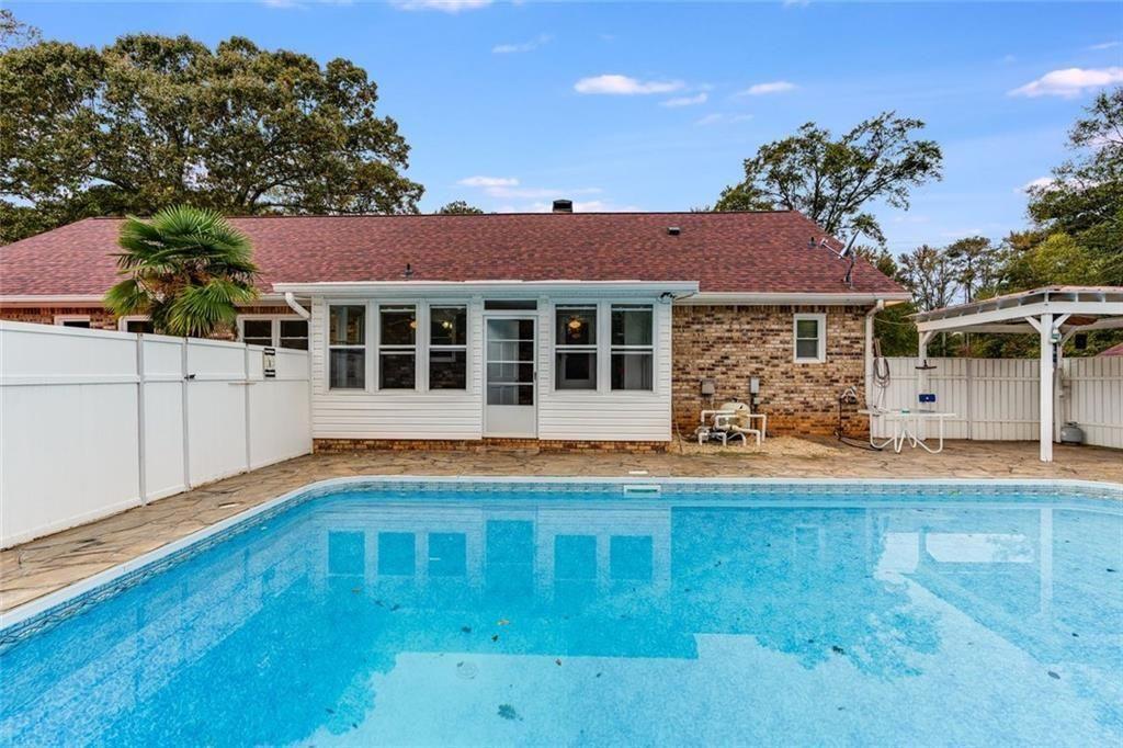 7306 Mt Vernon Road Lithia Springs, GA 30122 - Photo 31 of 48 front view of a house with a big yard