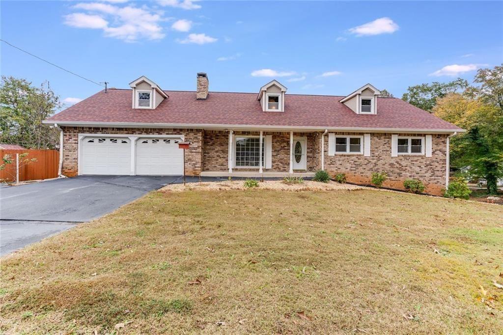 7306 Mt Vernon Road Lithia Springs, GA 30122 - Photo 41 of 48 a front view of a house with yard