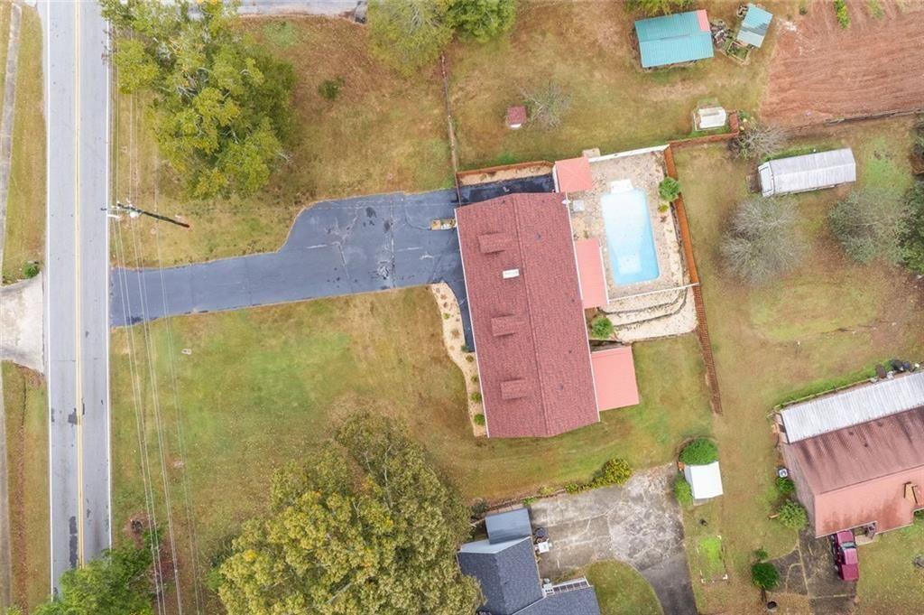 7306 Mt Vernon Road Lithia Springs, GA 30122 - Photo 44 of 48 an aerial view of residential house with outdoor space