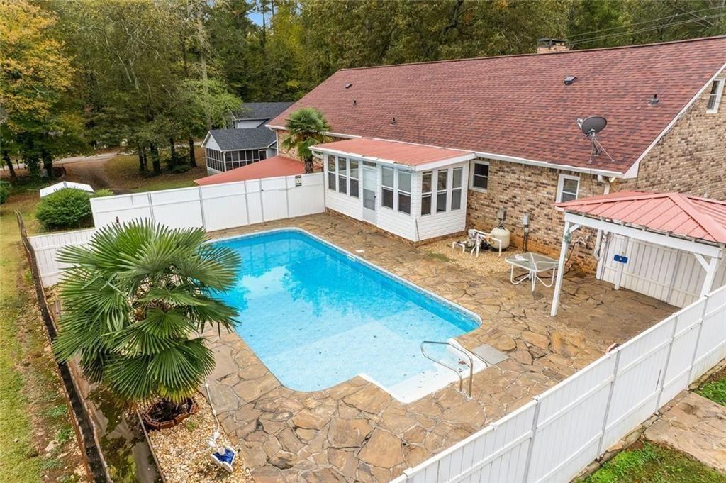 7306 Mt Vernon Road Lithia Springs, GA 30122 - Photo 46 of 48 a view of a house with pool