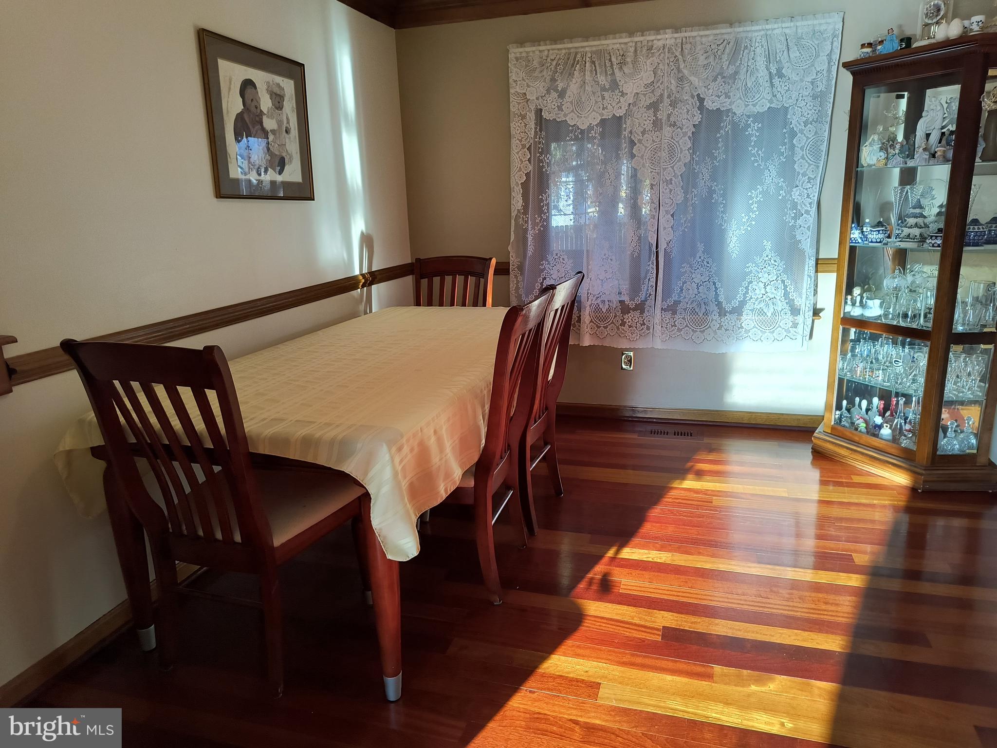 102 Providence Drive Bear, DE 19701 - Photo 6 of 21 a view of a dining room with furniture and wooden floor