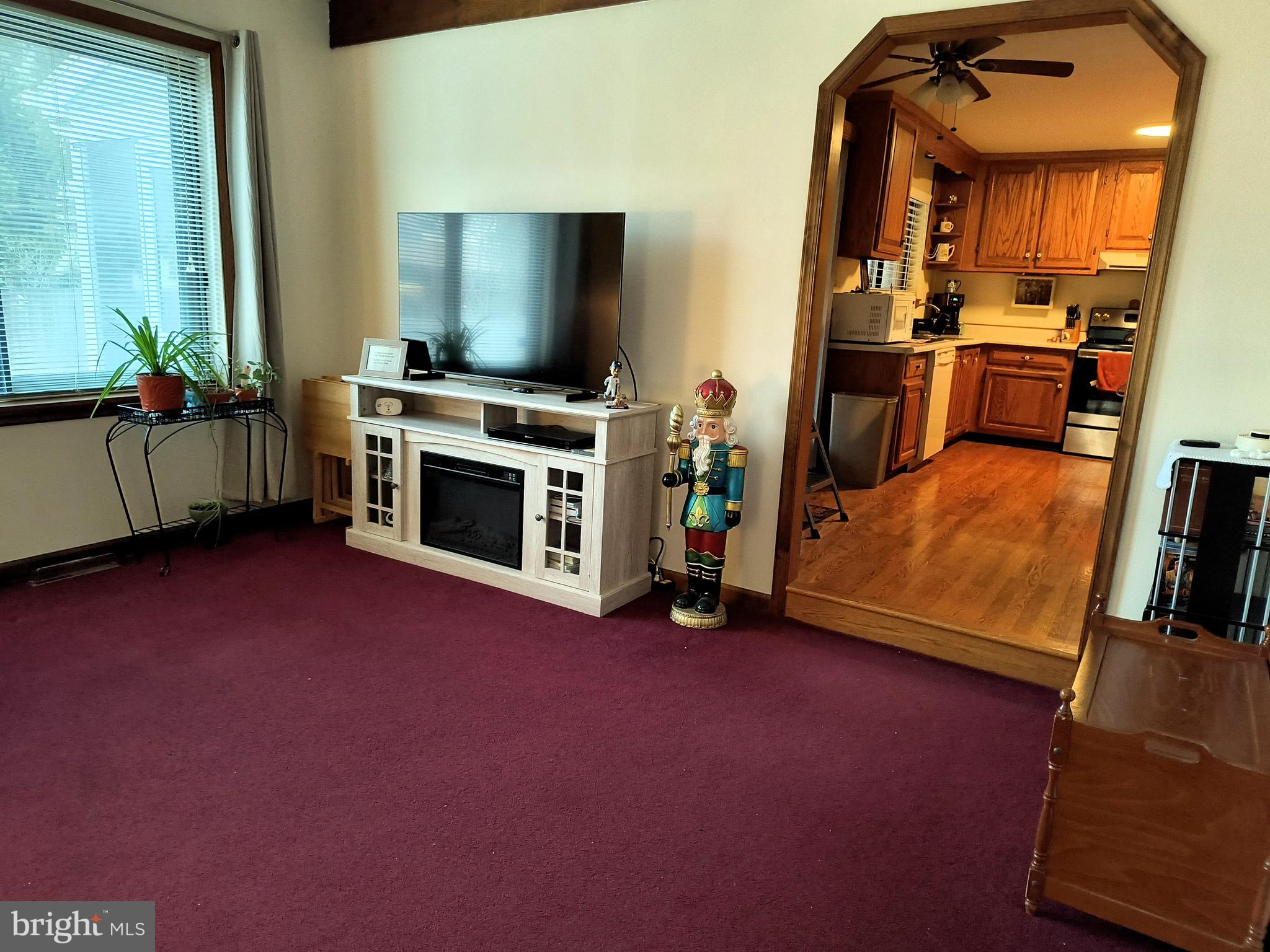102 Providence Drive Bear, DE 19701 - Photo 8 of 21 a view of a livingroom with furniture and a flat screen tv