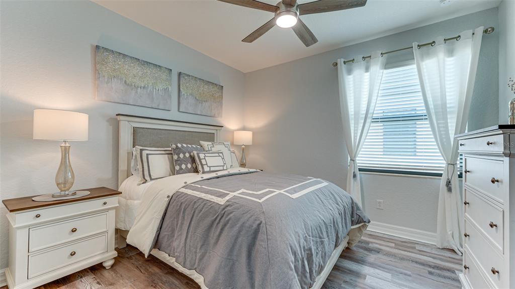 5725 Cheech Glen Lakewood Ranch, FL 34211 - Photo 19 of 63 a bedroom with a bed and a window