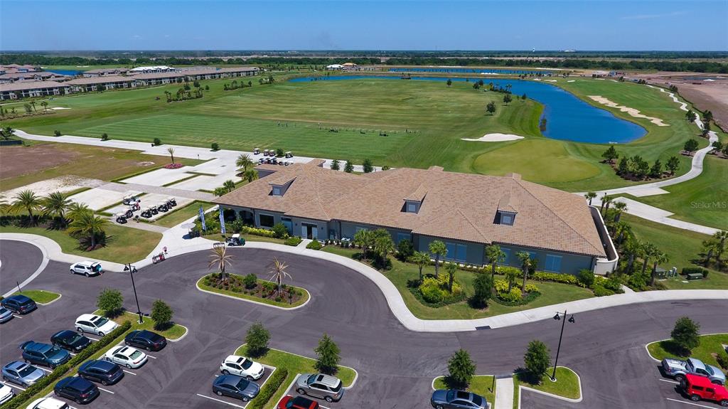 5725 Cheech Glen Lakewood Ranch, FL 34211 - Photo 37 of 63 an aerial view of a house with a garden