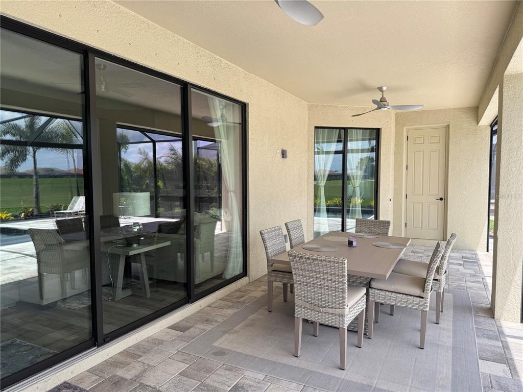5725 Cheech Glen Lakewood Ranch, FL 34211 - Photo 61 of 63 a dining room with furniture and window