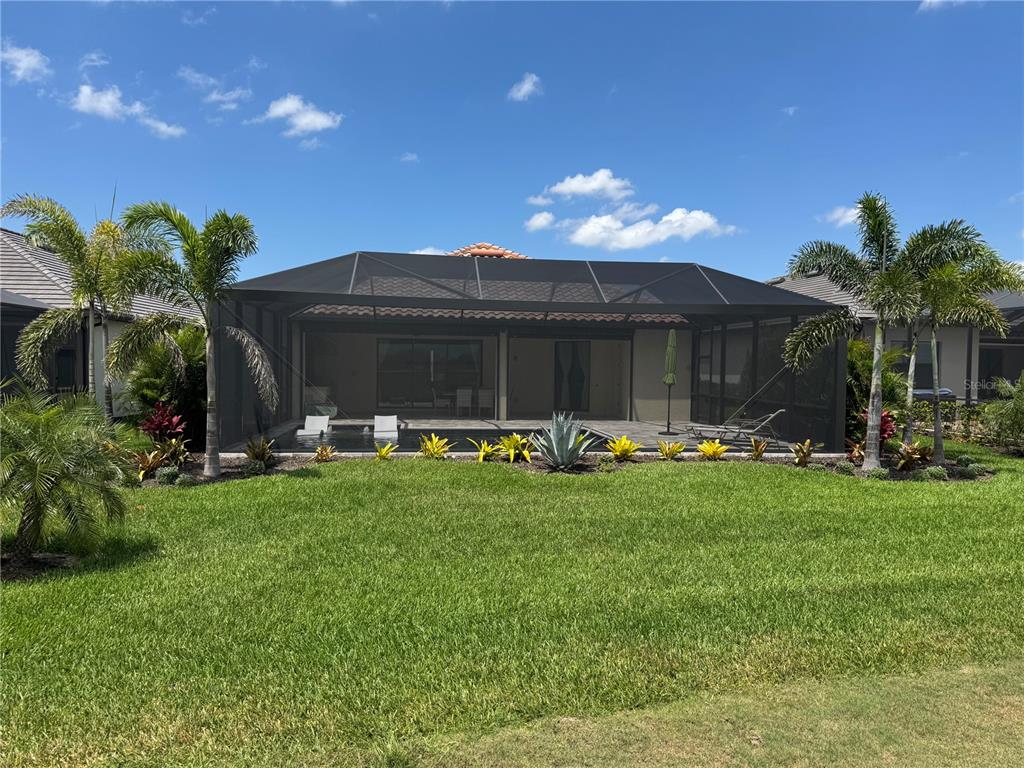 5725 Cheech Glen Lakewood Ranch, FL 34211 - Photo 63 of 63 a view of a house with backyard and sitting area