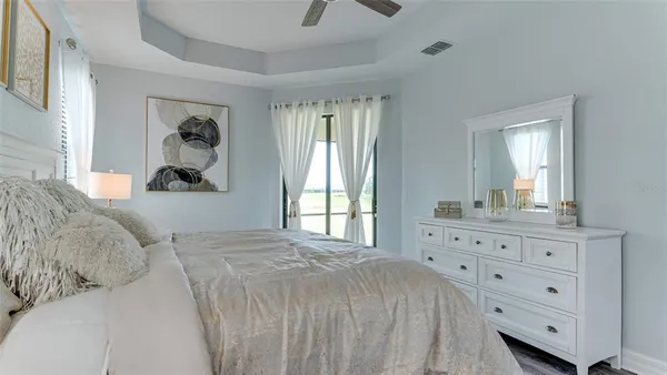 a living room with furniture and a shower