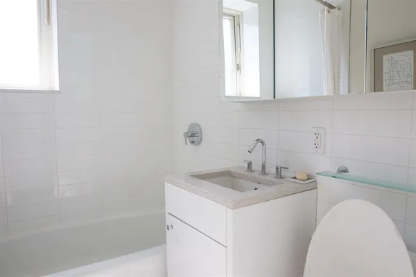 a bathroom with a sink and a bathtub