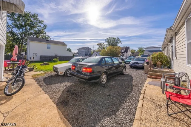 a car parked in front of a house