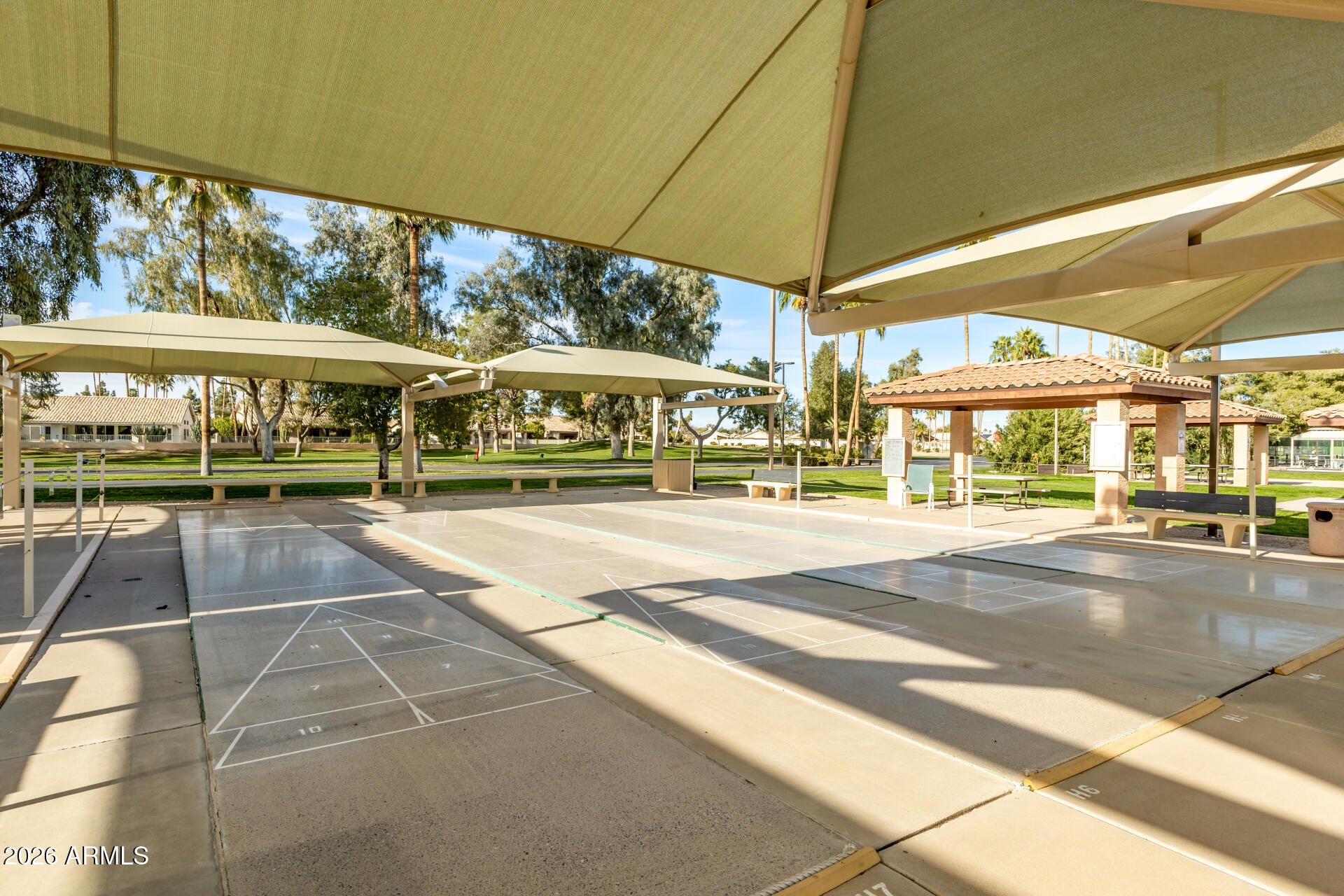 14300 West Bell Road, Unit 153 Surprise, AZ 85374 - Photo 15 of 19 a view of a building with a large window and outdoor space