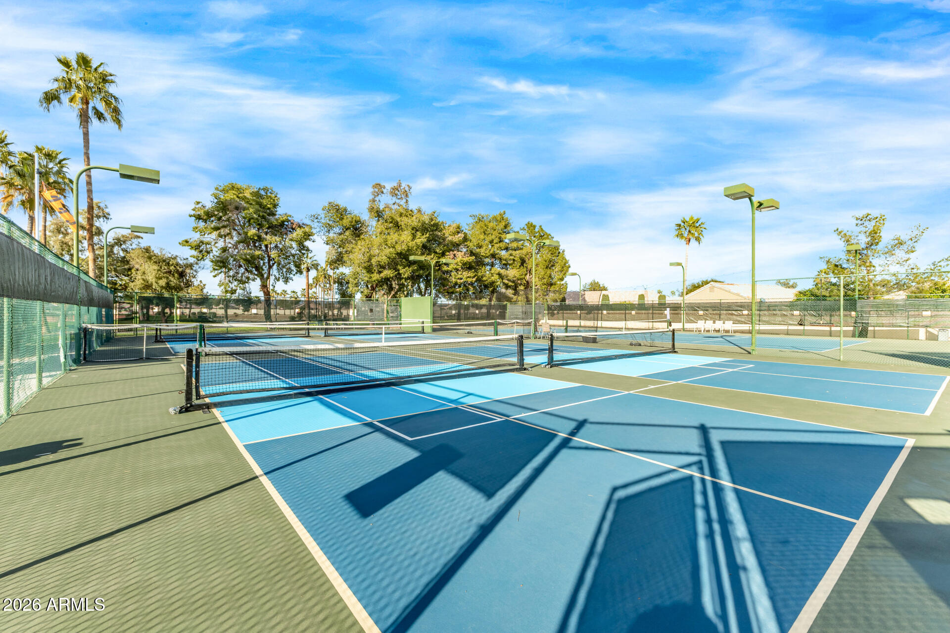 14300 West Bell Road, Unit 153 Surprise, AZ 85374 - Photo 17 of 19 a view of a tennis court