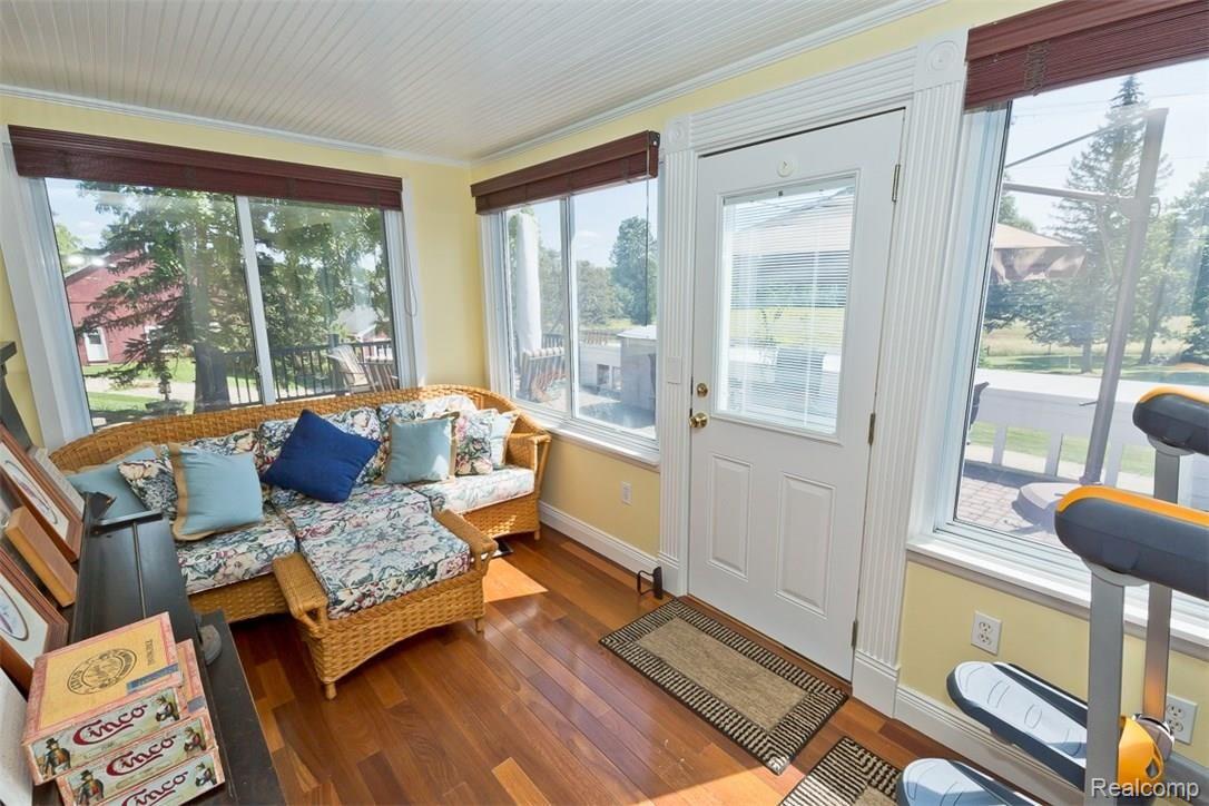 3175 Noble Road Oxford, MI 48370 - Photo 36 of 58 Sunroom leads out onto the terrace