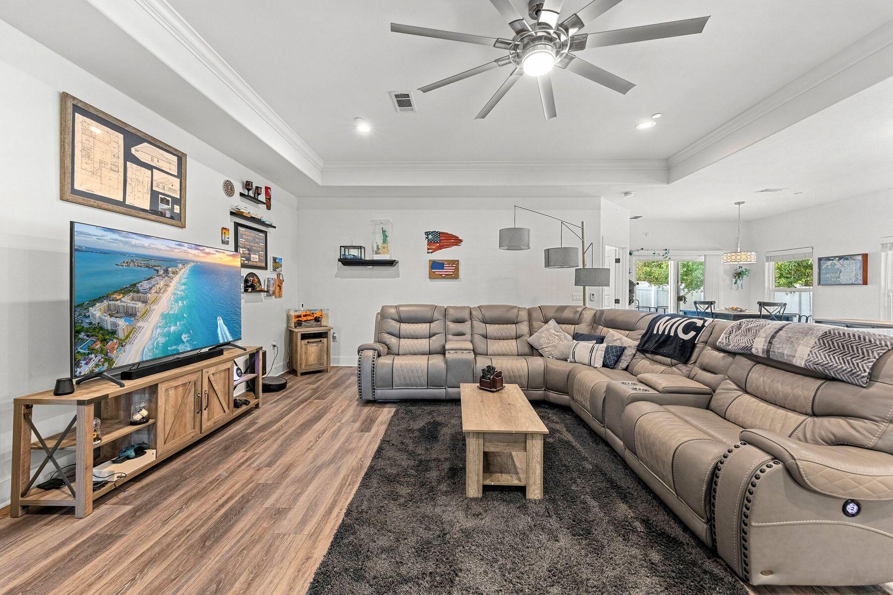 736 Comanche Drive Fort Walton Beach, FL 32547 - Photo 12 of 49 a living room with furniture and a flat screen tv