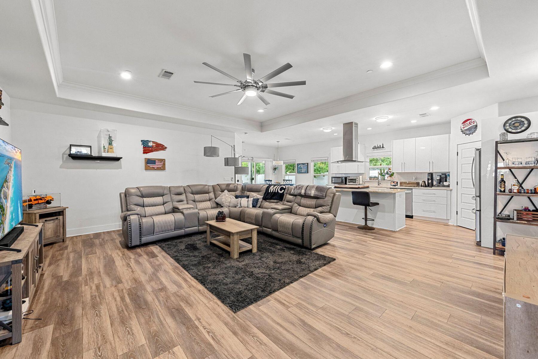 736 Comanche Drive Fort Walton Beach, FL 32547 - Photo 14 of 49 a living room with lots of furniture and kitchen view