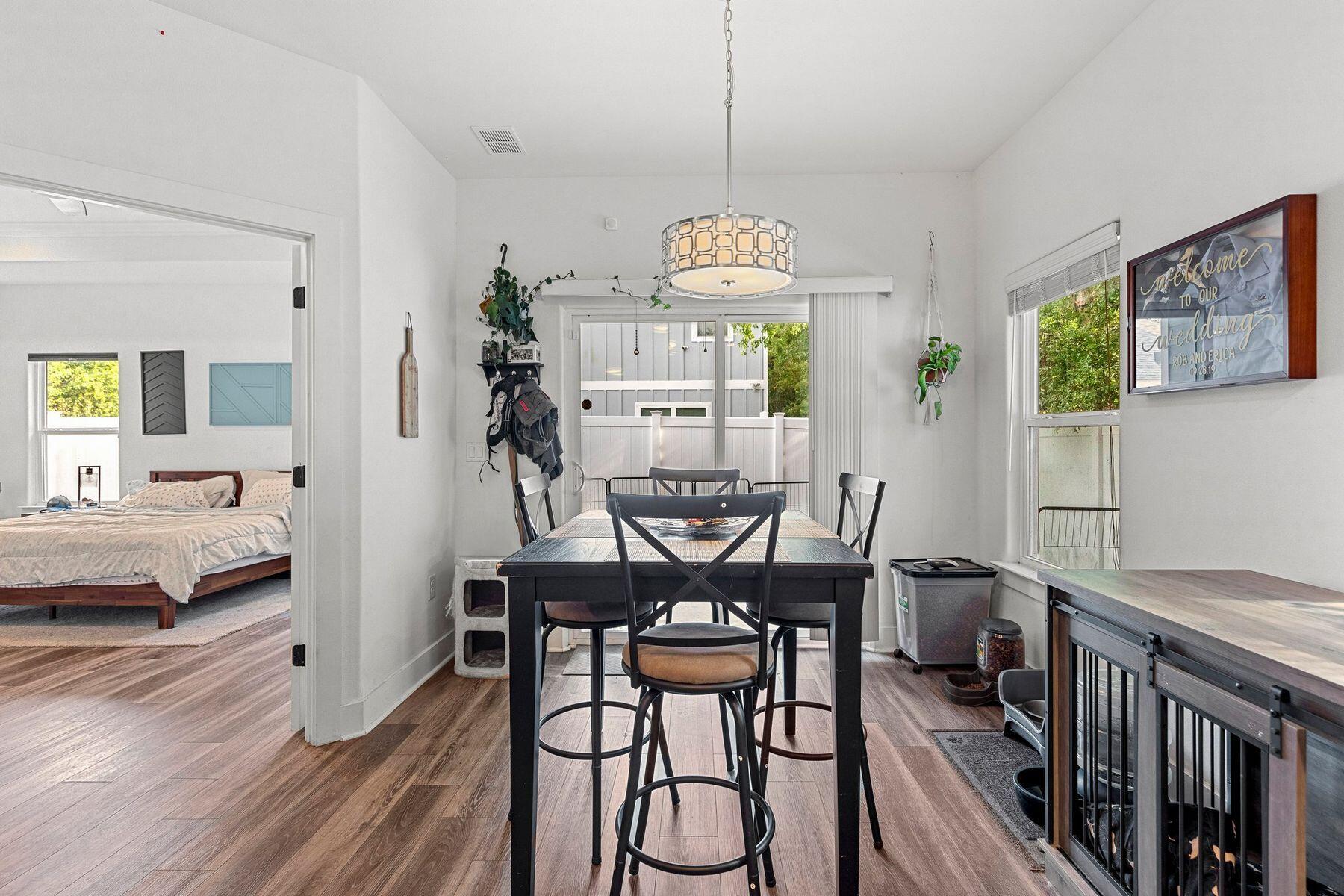 736 Comanche Drive Fort Walton Beach, FL 32547 - Photo 20 of 49 a view of a dining room with furniture window and wooden floor