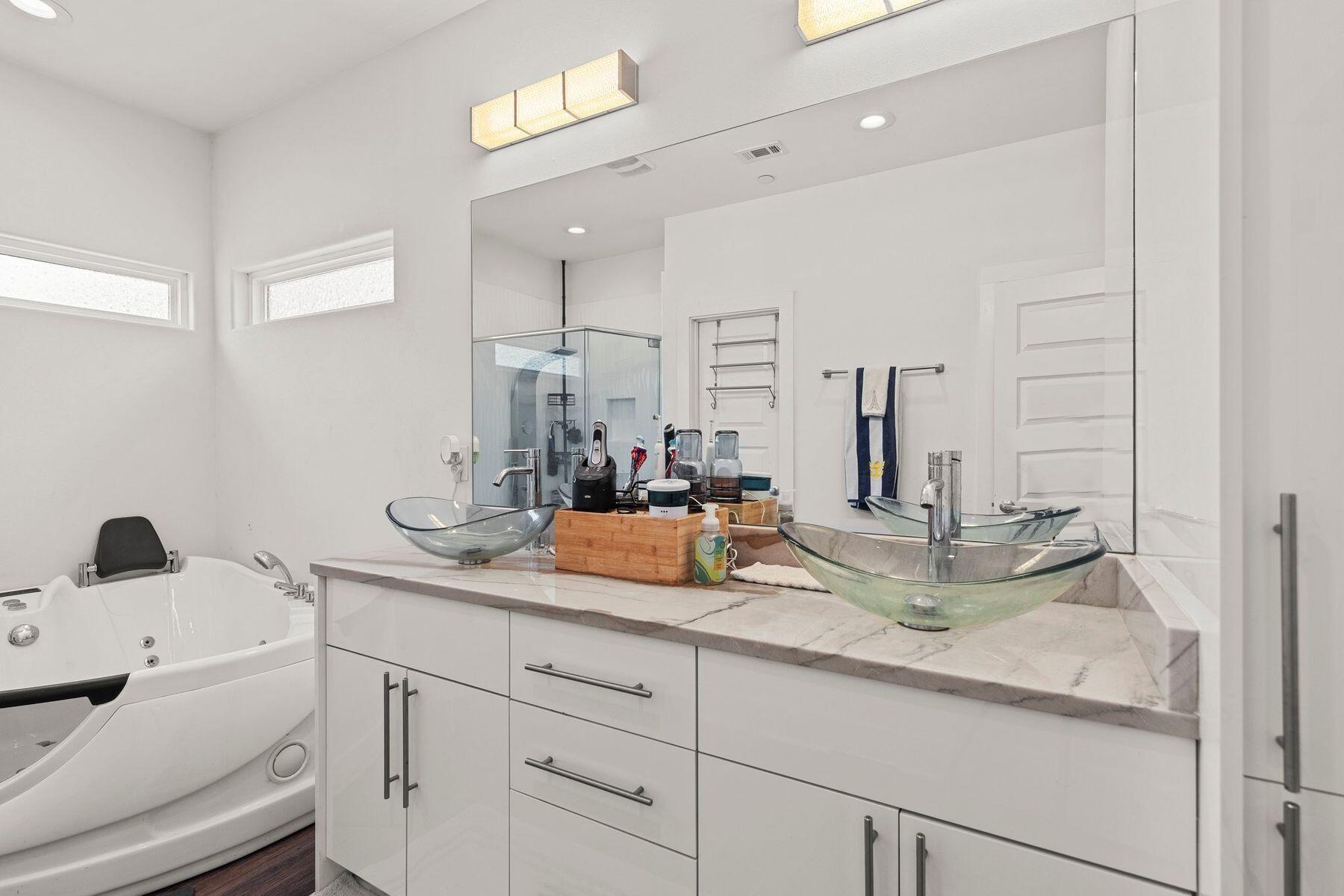 736 Comanche Drive Fort Walton Beach, FL 32547 - Photo 28 of 49 a bathroom with a sink and a mirror