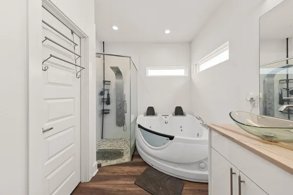 a bathroom with a sink and mirror