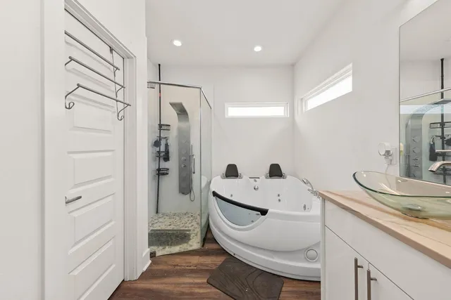 a bathroom with a sink and mirror