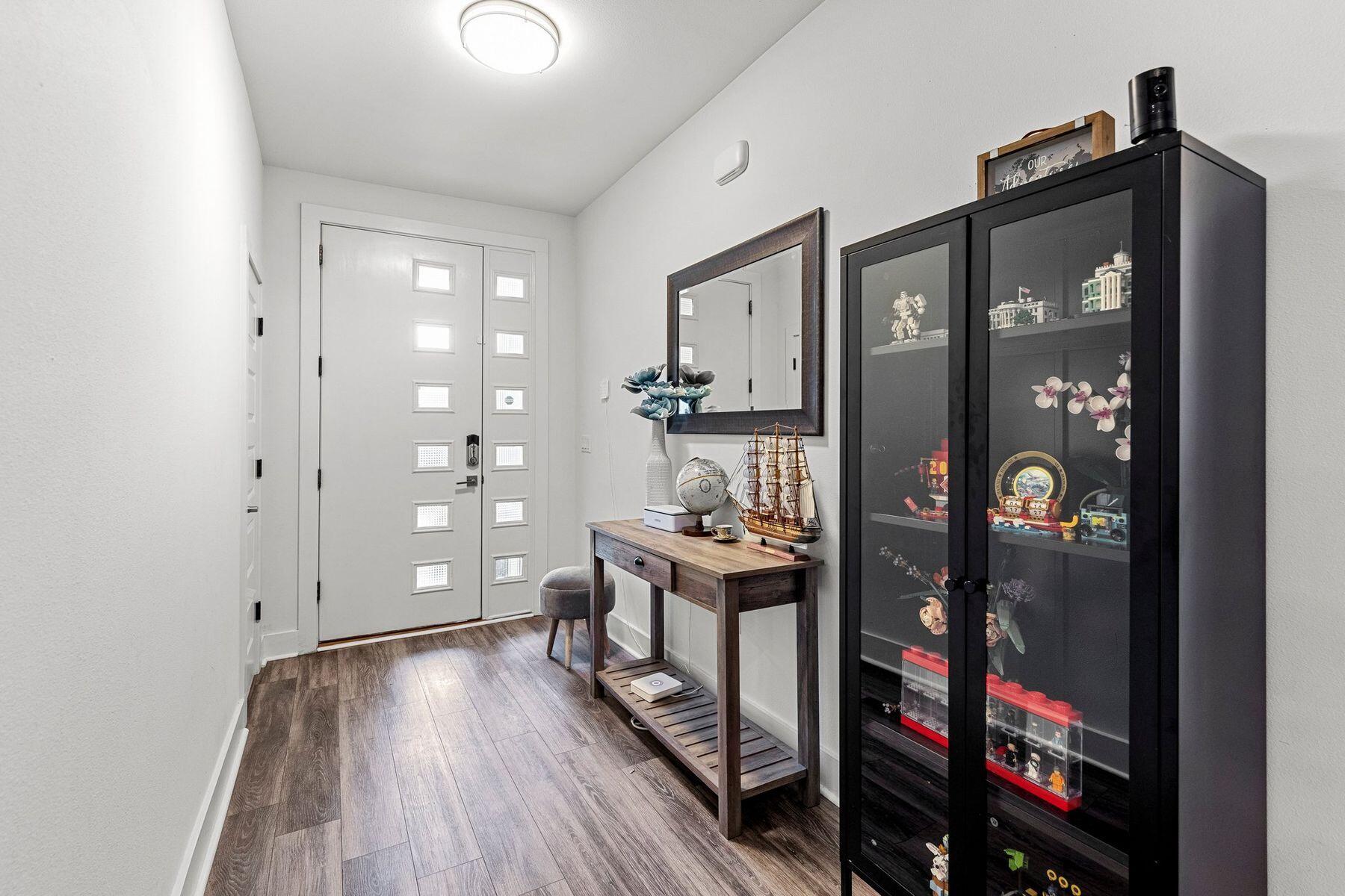736 Comanche Drive Fort Walton Beach, FL 32547 - Photo 3 of 49 a view of a hallway to a livingroom and furniture