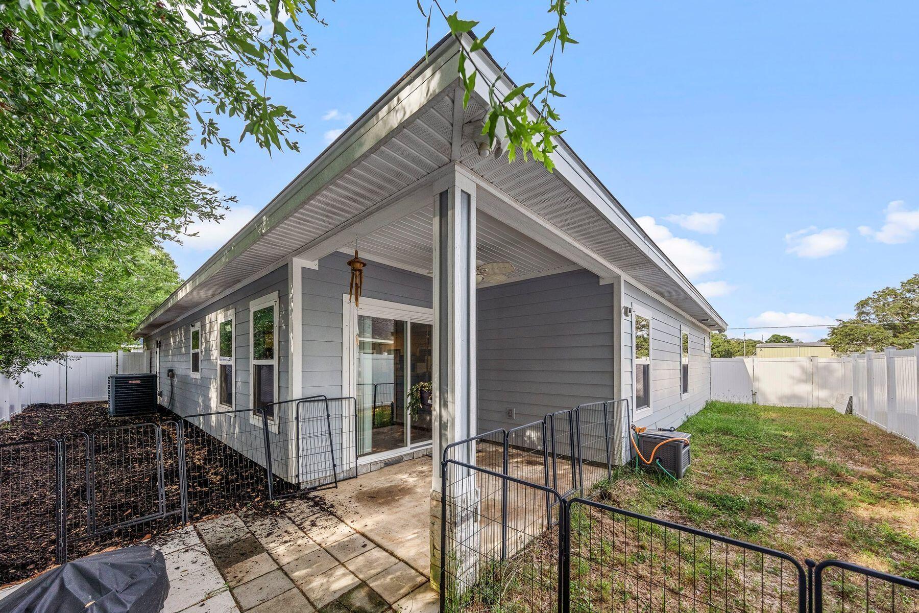 736 Comanche Drive Fort Walton Beach, FL 32547 - Photo 34 of 49 a view of a house with wooden fence