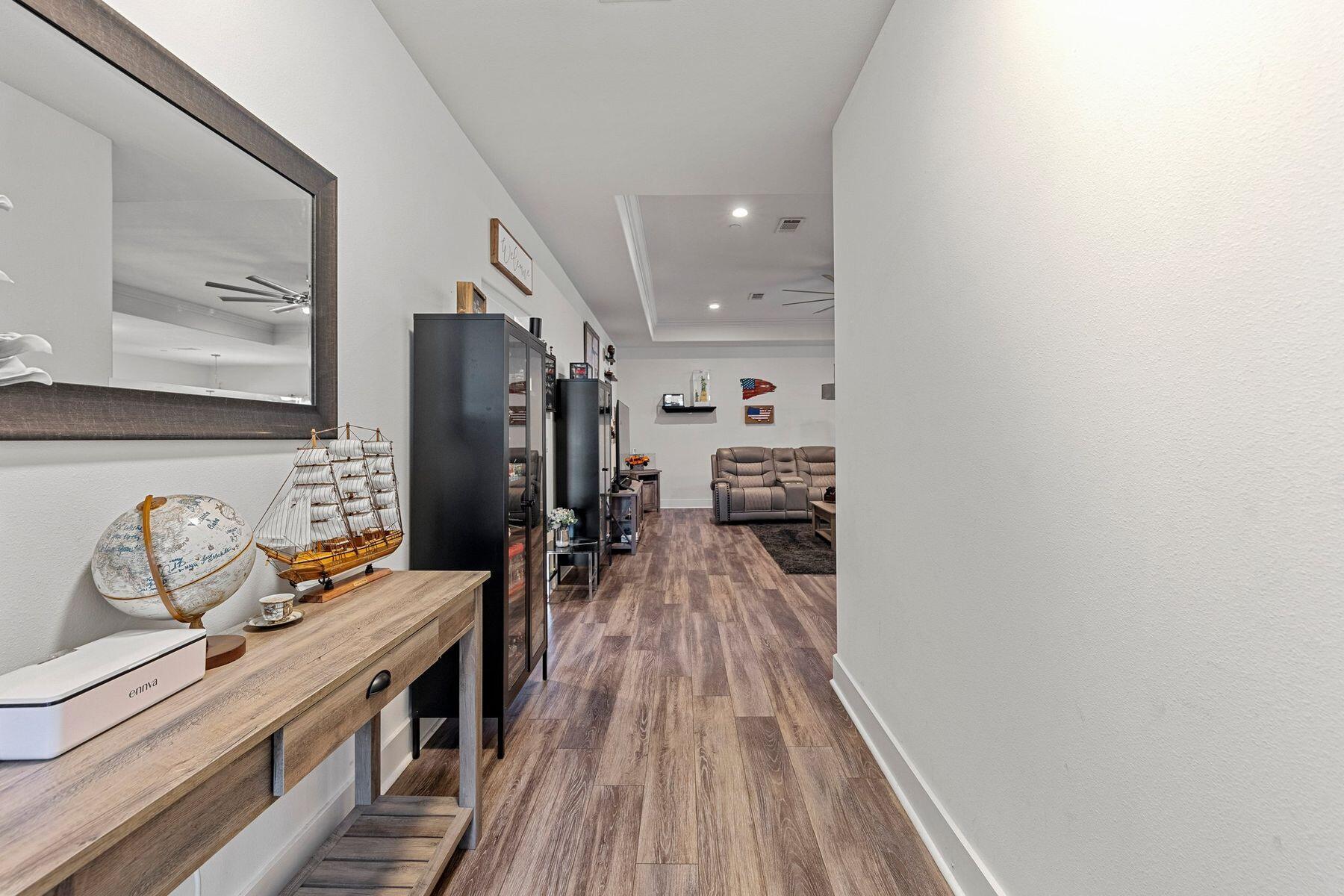 736 Comanche Drive Fort Walton Beach, FL 32547 - Photo 4 of 49 a view of a living room with furniture and wooden floor