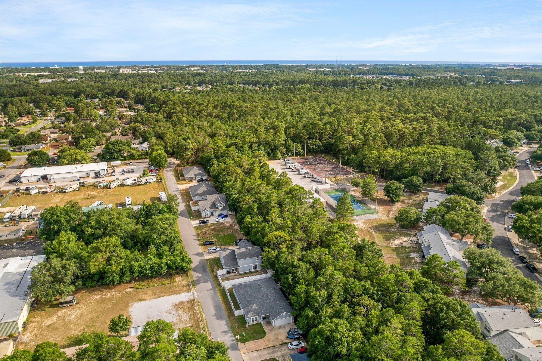 736 Comanche Drive Fort Walton Beach, FL 32547 - Photo 46 of 49 a view of a city with lots of trees