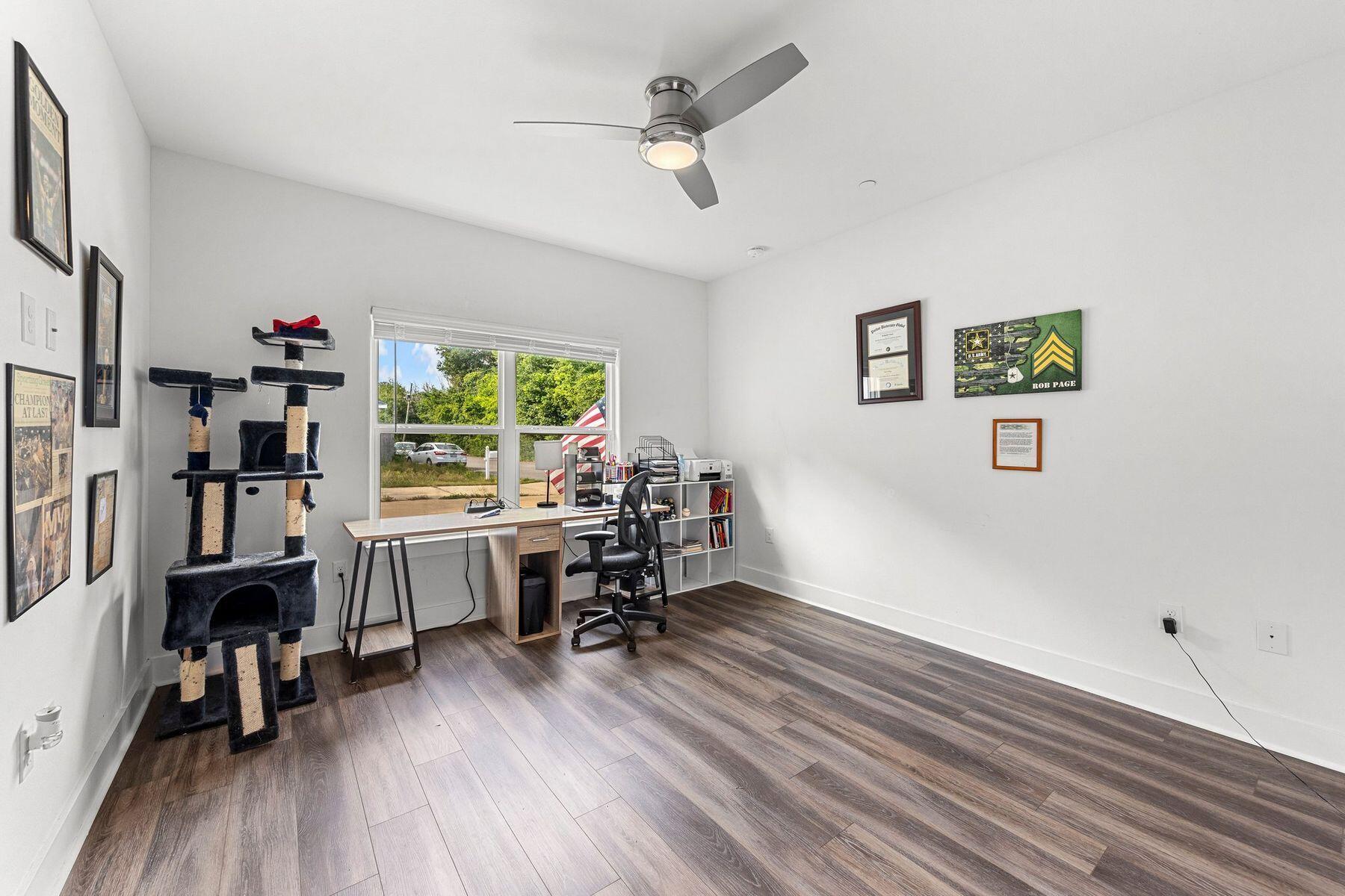 736 Comanche Drive Fort Walton Beach, FL 32547 - Photo 7 of 49 a view of a workspace with furniture and a window