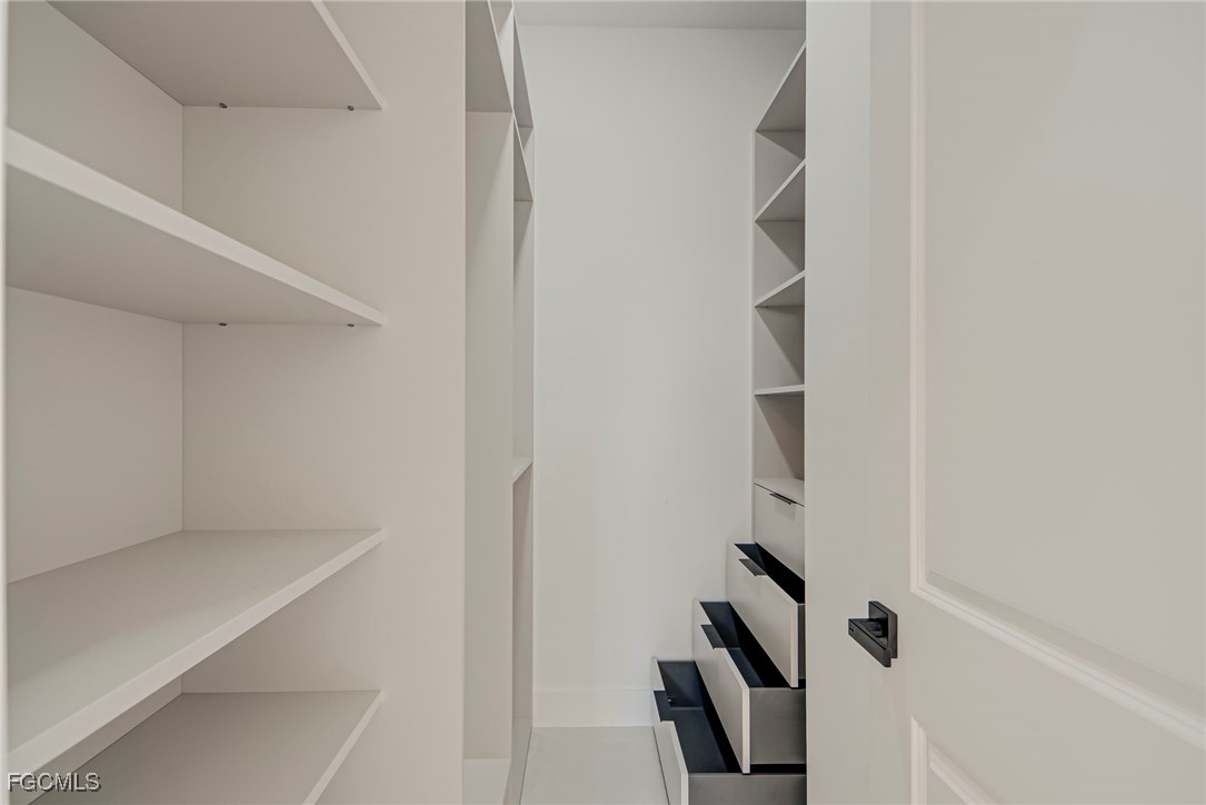 3601 28th Street Southwest Lehigh Acres, FL 33976 - Photo 16 of 35 a view of walk in closet