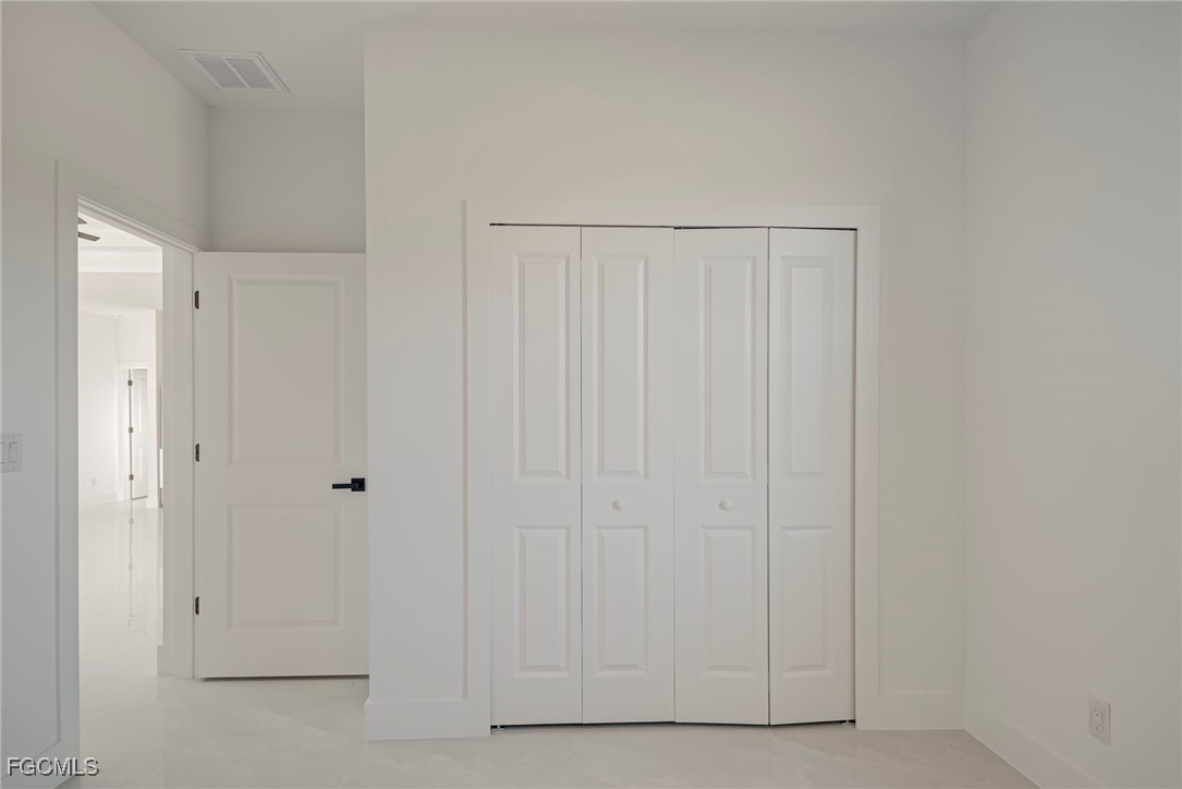 3601 28th Street Southwest Lehigh Acres, FL 33976 - Photo 19 of 35 a view of a closet area