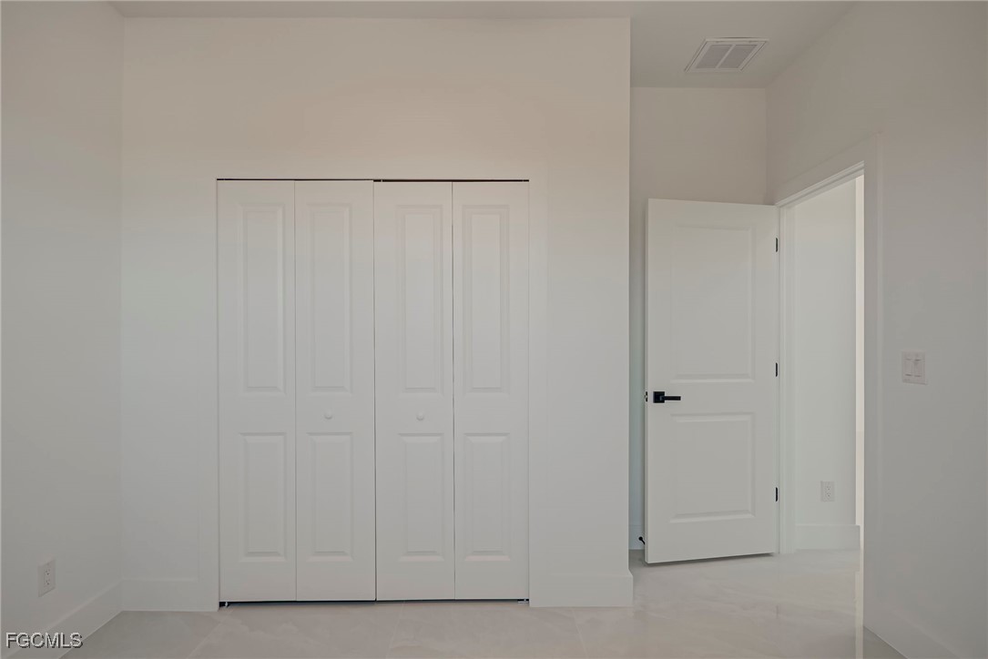 3601 28th Street Southwest Lehigh Acres, FL 33976 - Photo 22 of 35 a view of closet area