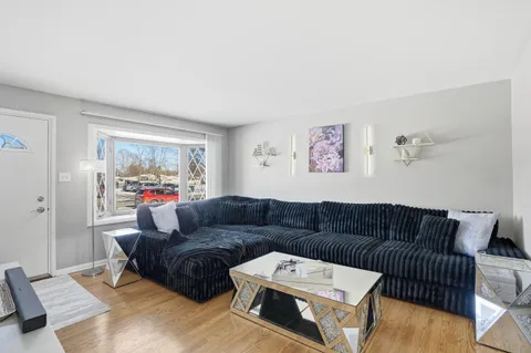 a living room with furniture and a couch