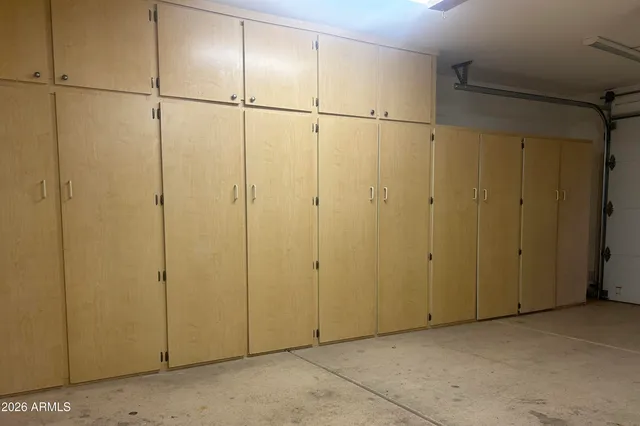 a kitchen with stainless steel appliances granite countertop a sink and a stove