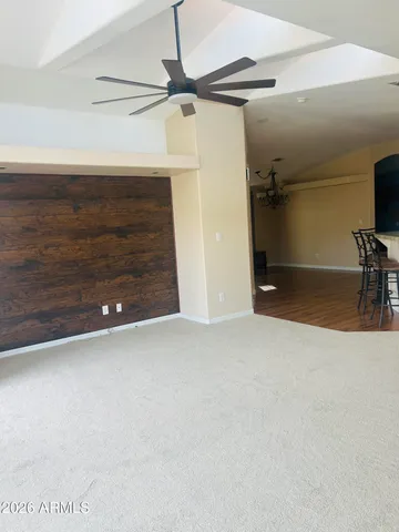 a view of a livingroom with wooden floor