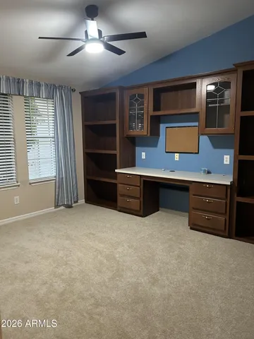 a view of room with window and hardwood floor