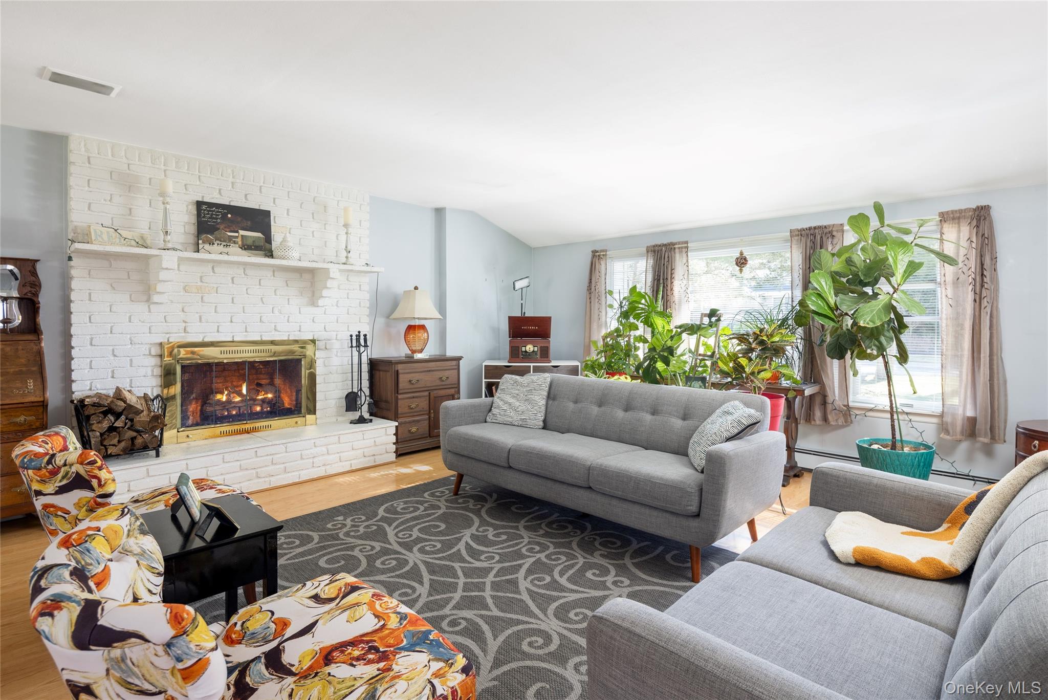 340 Rambler Road Southold, NY 11971 - Photo 5 of 18 Large Brick Fireplace in Living Room