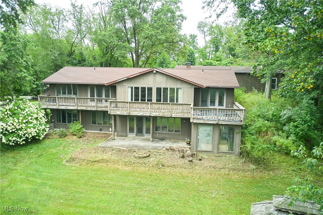 4196 Webb Road Ravenna, OH 44266 - Photo 2 of 29 Walls of windows and doors give a fabulous view to the property.