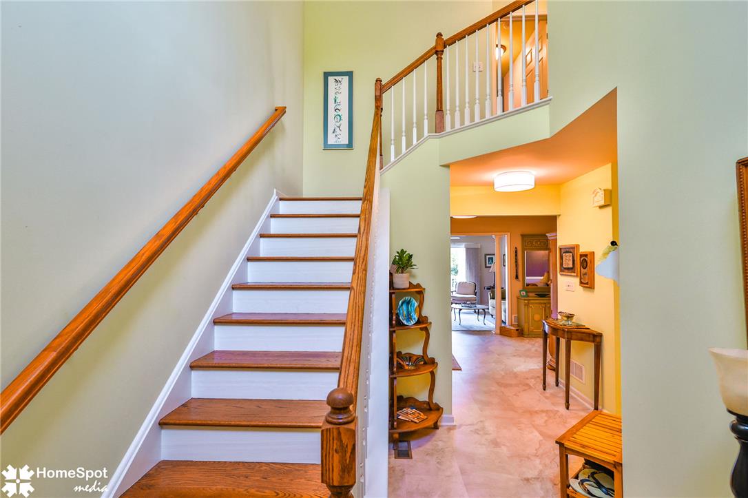 4191 Walter Road Bethlehem, PA 18020 - Photo 2 of 23 A grand staircase with rich wooden treads and pristine white risers welcomes you into this inviting foyer.