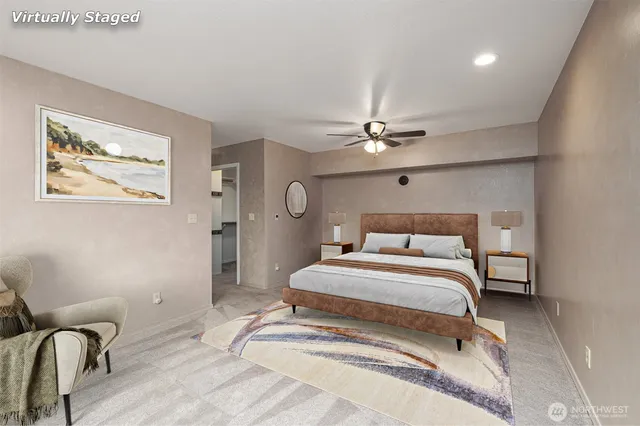 a bedroom with a bed and lamp