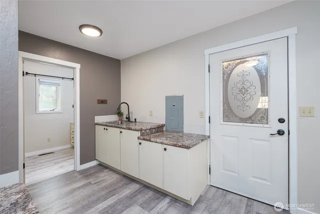 a view of a room that has a door