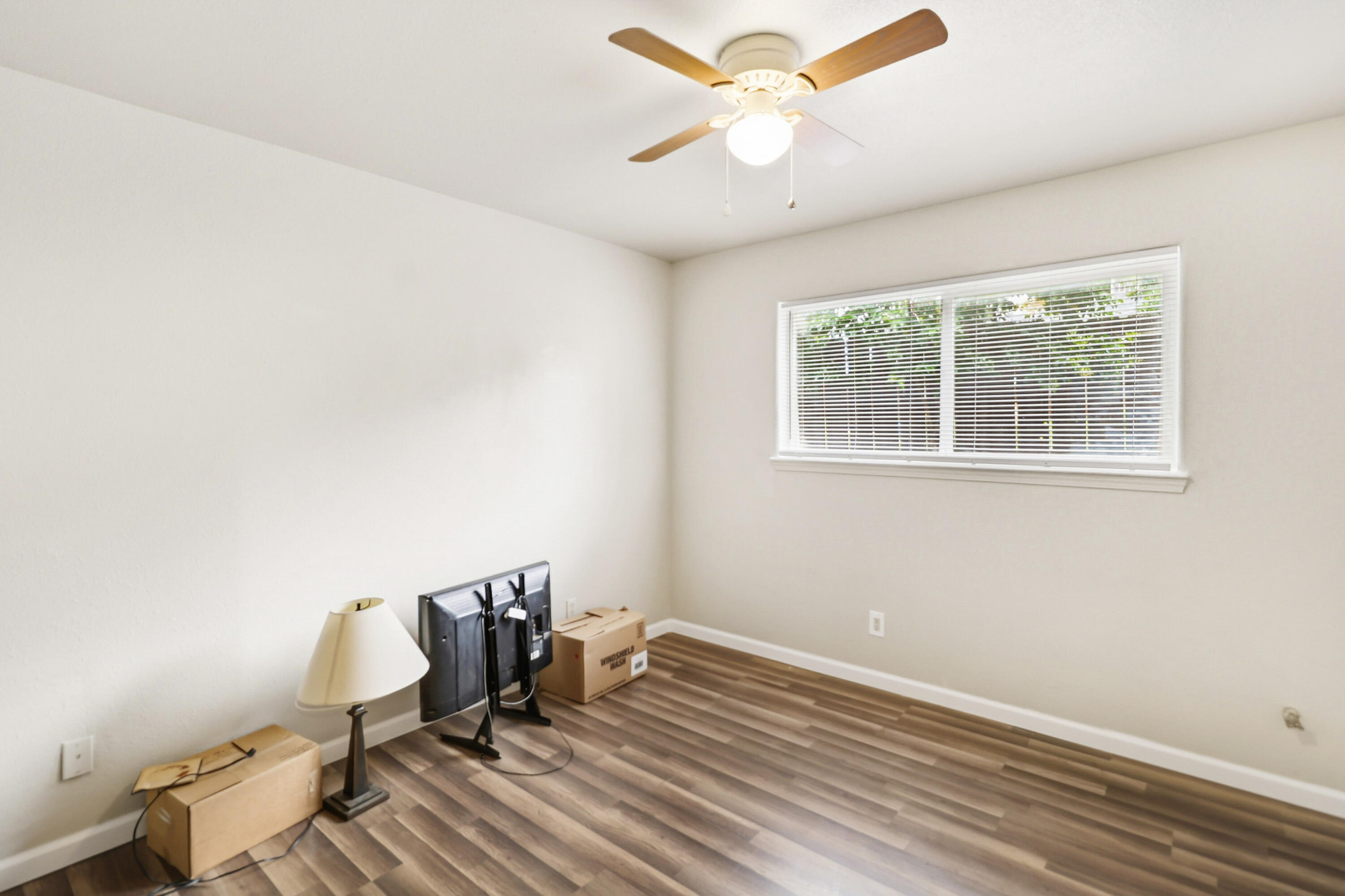 1152-1154 Echo Road Redding, CA 96002 - Photo 20 of 32 a view of a workspace with wooden floor and a window