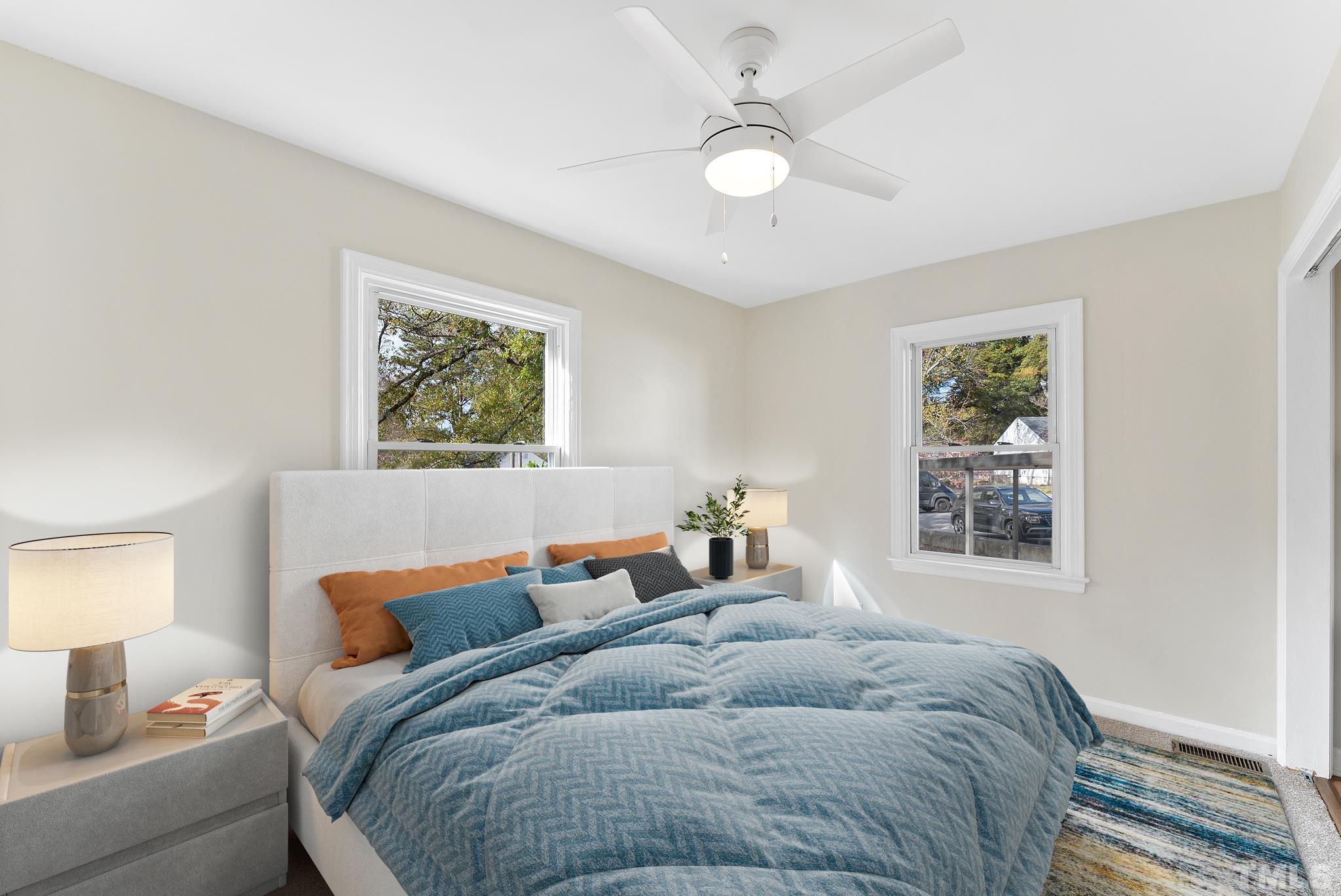 401 Plainview Avenue Raleigh, NC 27604 - Photo 16 of 28 a bedroom with bed and window