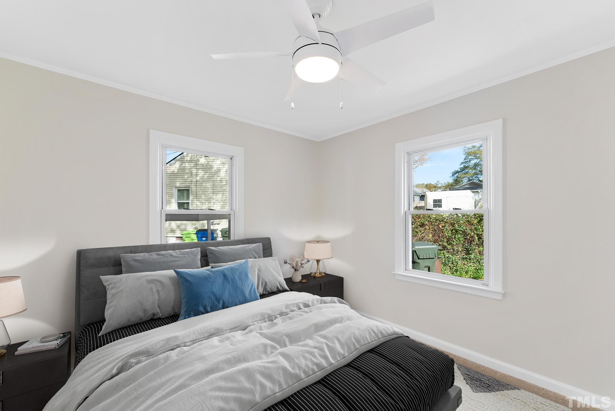 401 Plainview Avenue Raleigh, NC 27604 - Photo 19 of 28 a bedroom with a bed and a window
