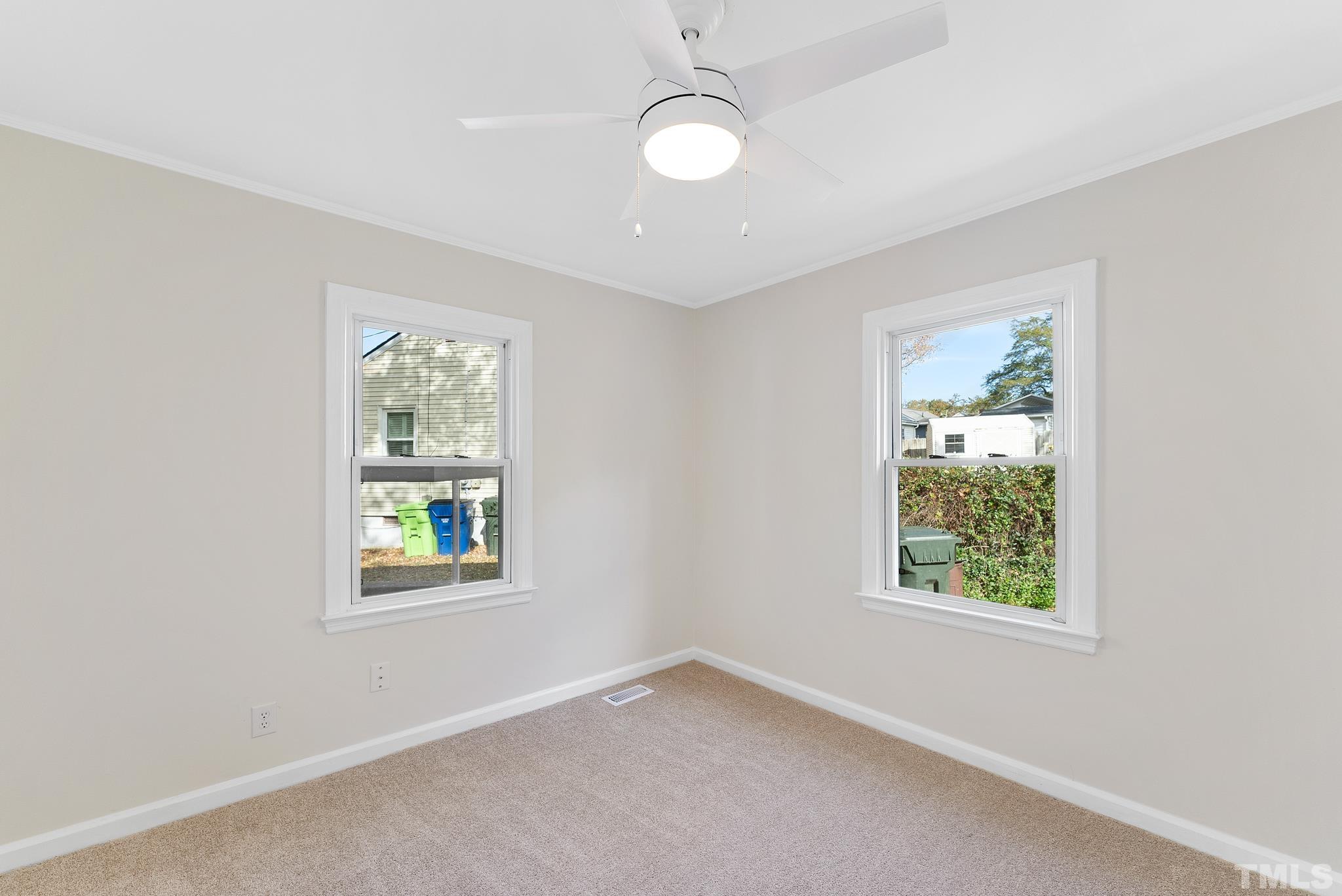 401 Plainview Avenue Raleigh, NC 27604 - Photo 20 of 28 an empty room with windows and closet