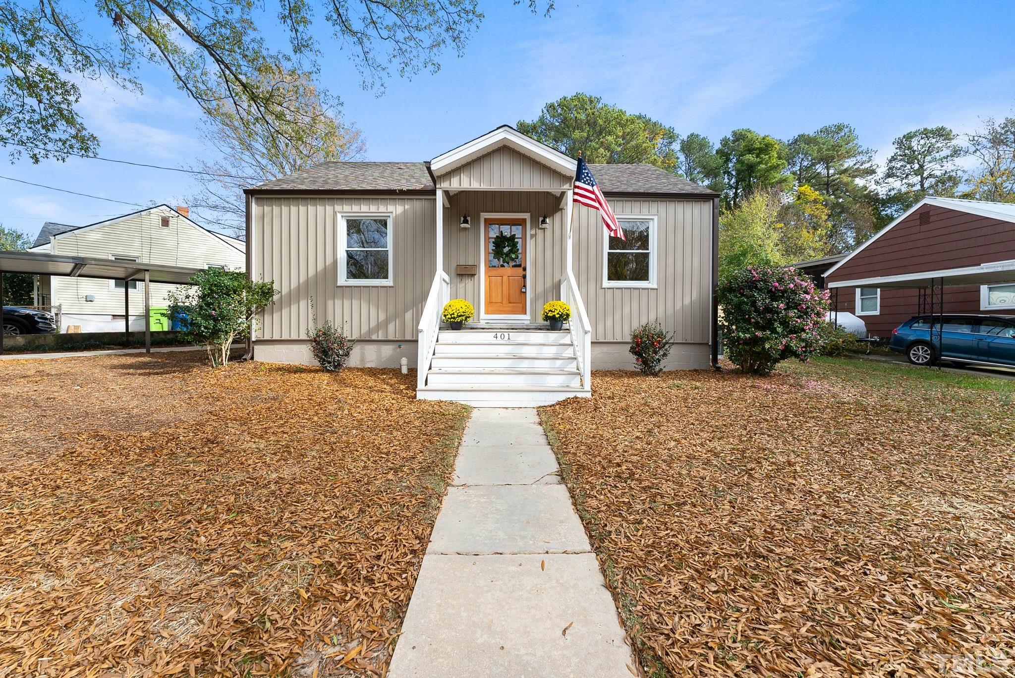 401 Plainview Avenue Raleigh, NC 27604 - Photo 2 of 28 front view of a house with a yard