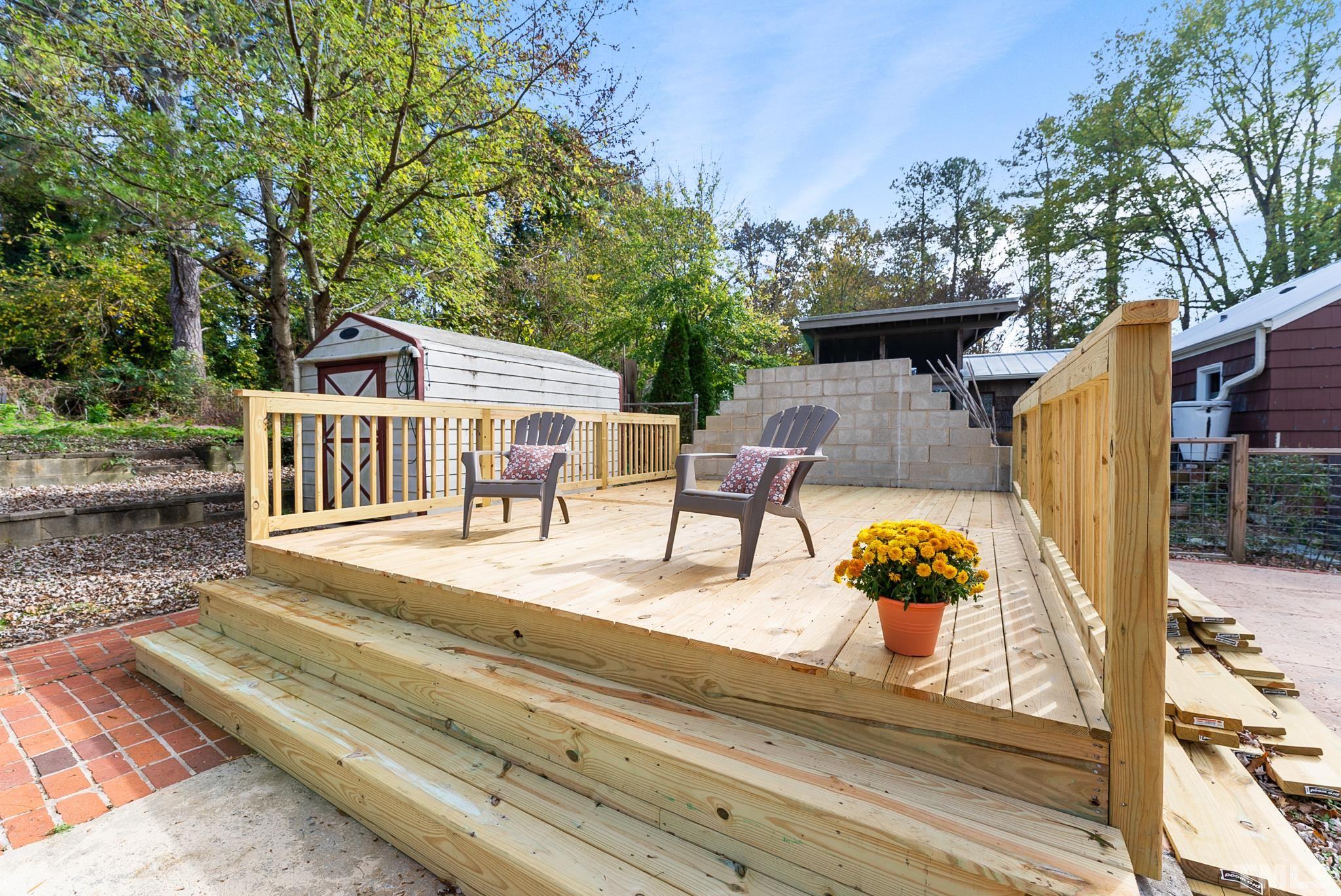 401 Plainview Avenue Raleigh, NC 27604 - Photo 25 of 28 a view of a house with backyard and sitting area