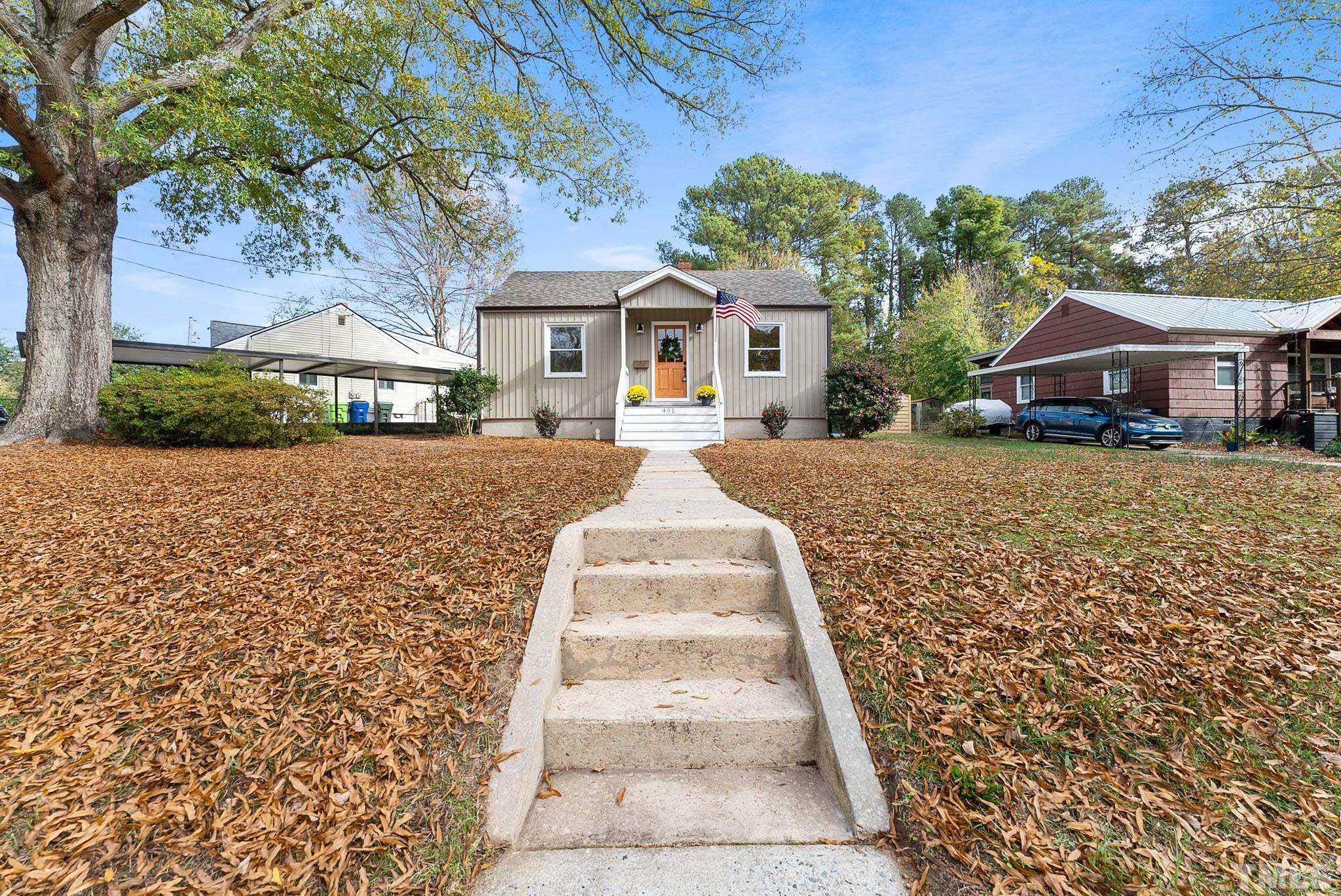 401 Plainview Avenue Raleigh, NC 27604 - Photo 3 of 28 a front view of a house with a yard