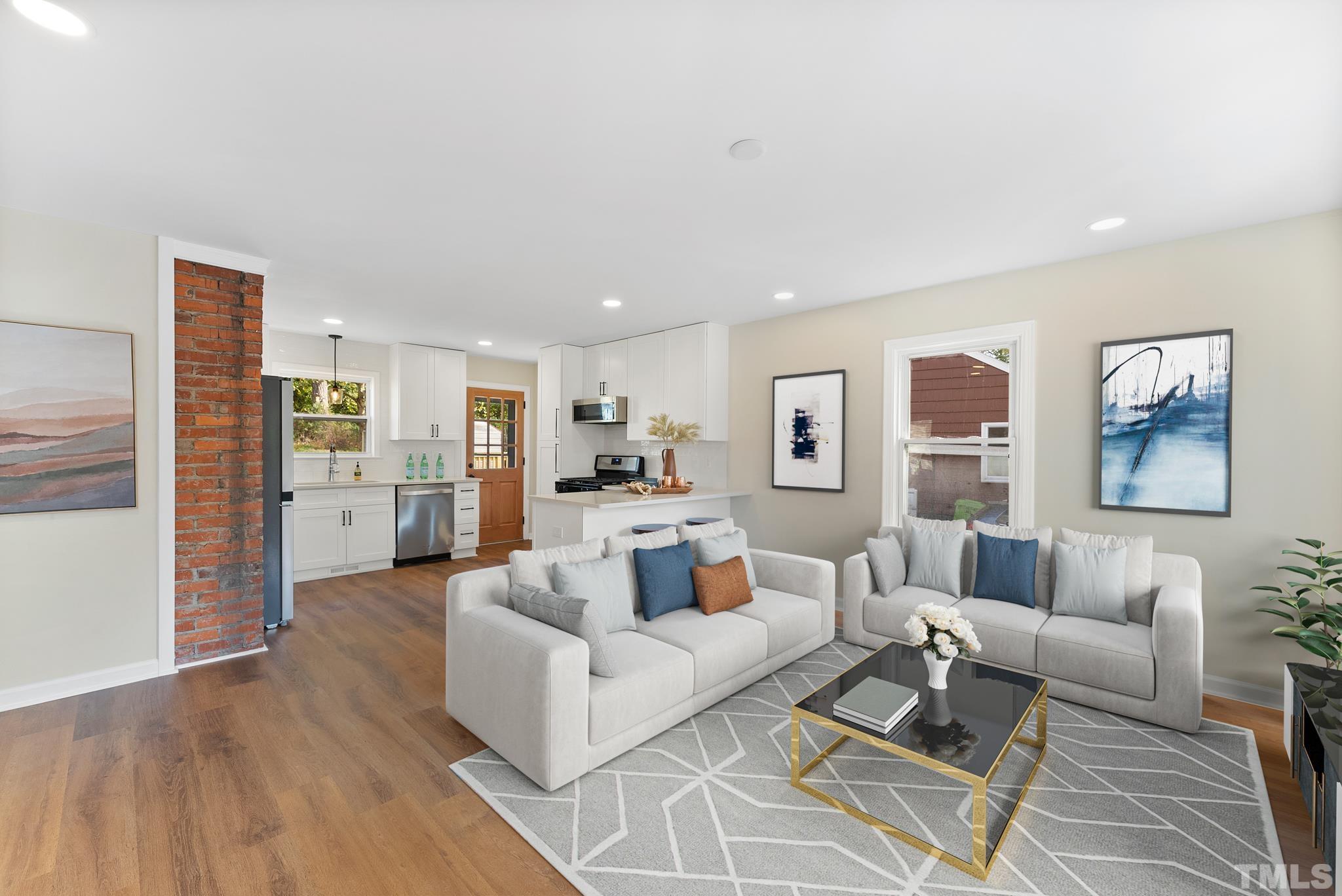 401 Plainview Avenue Raleigh, NC 27604 - Photo 6 of 28 a living room with furniture and view of kitchen